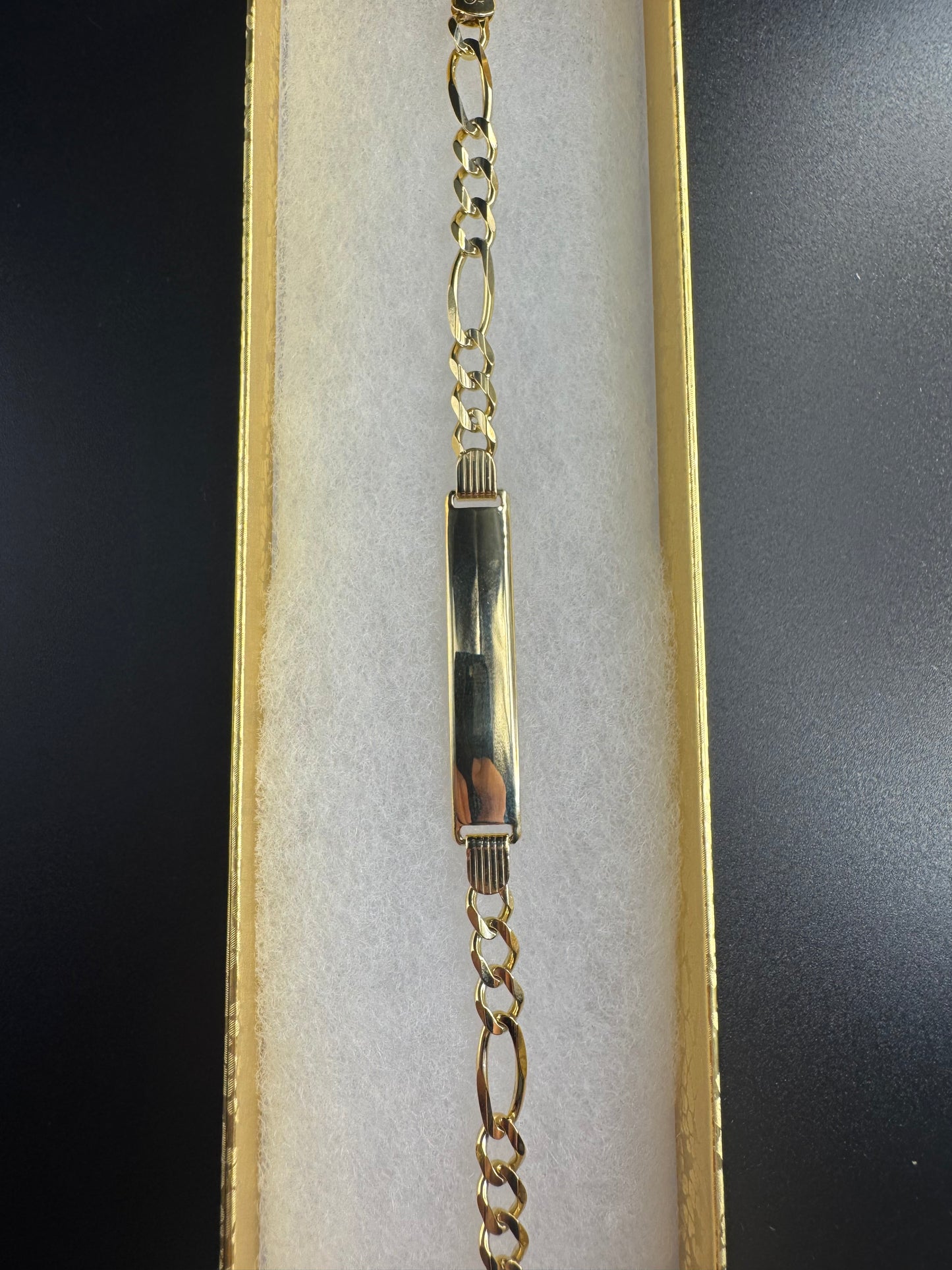 solid 14k yellow figaro with name plate bracelet