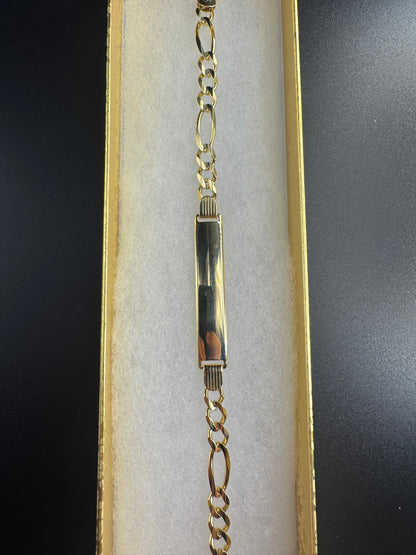 solid 14k yellow figaro with name plate bracelet